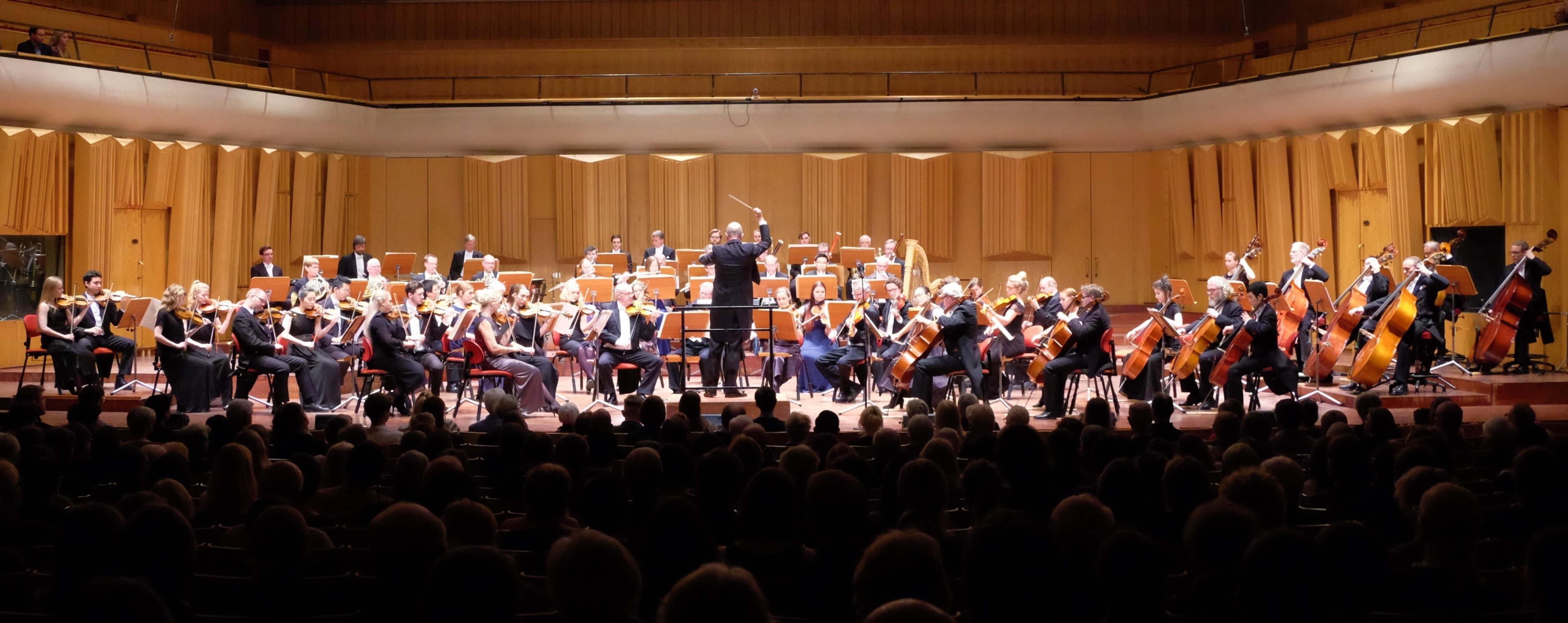 A photo of the KTH Academic Orchestra playing in Berwaldhallen in Stockholm.